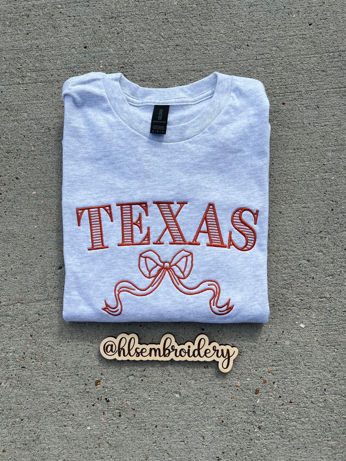 Ash Grey shirt with Texas embroidery with bow.