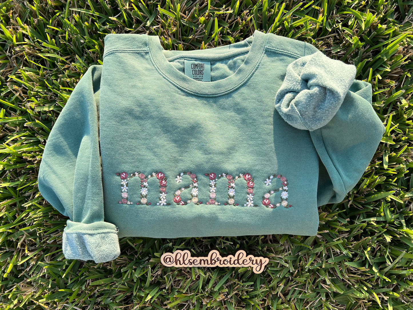 crewneck with floral embroidery with mama text on the front