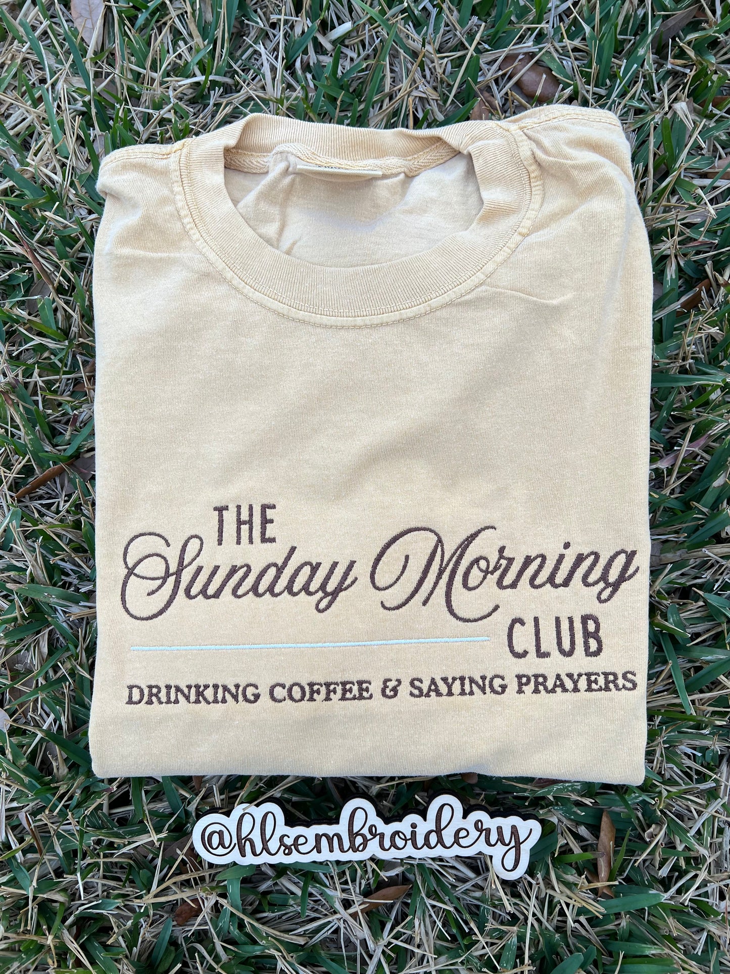 Butter yellow shirt with embroidery wording on the front