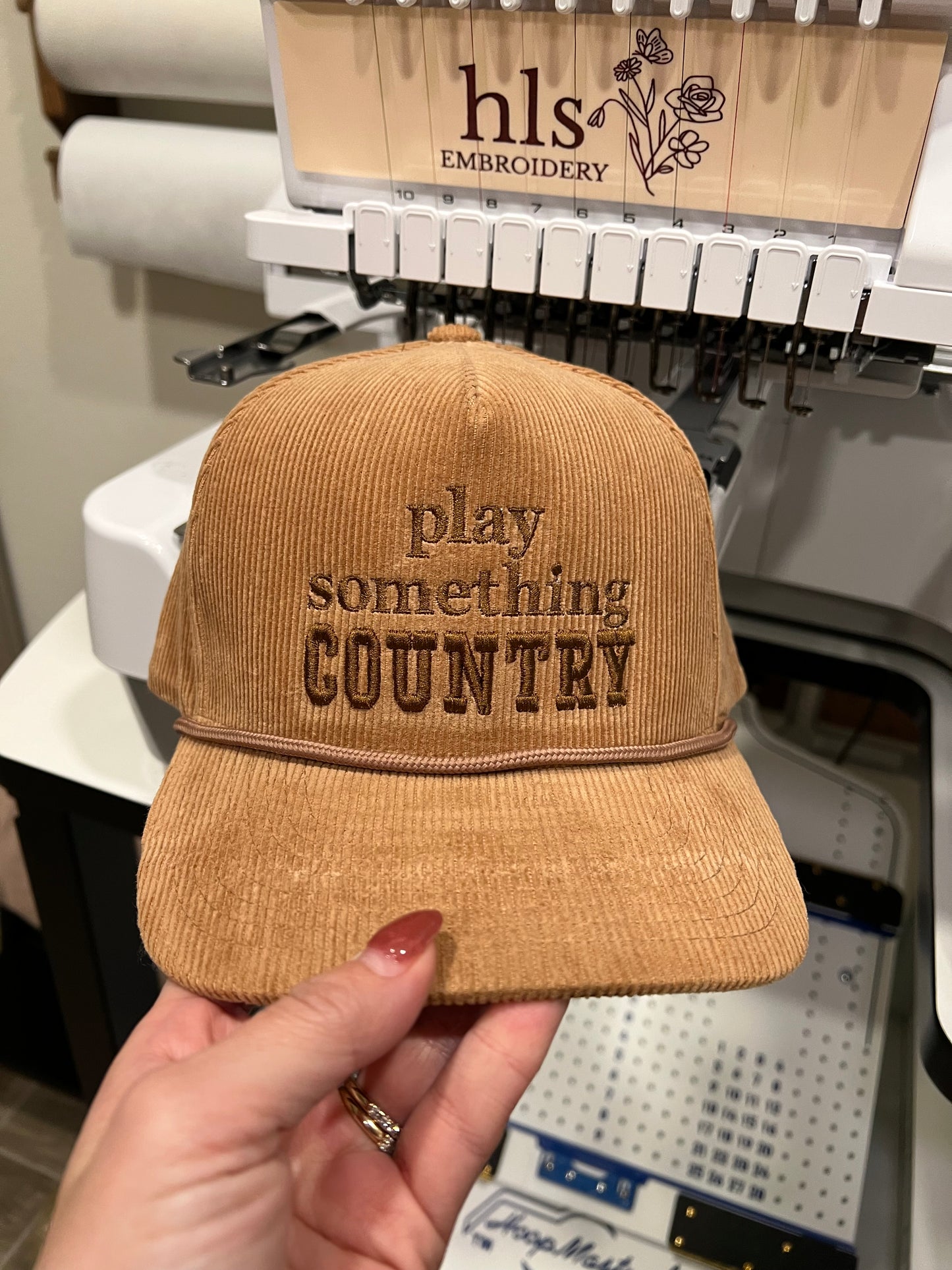 Brown Corduroy with 'play something country' embroidery