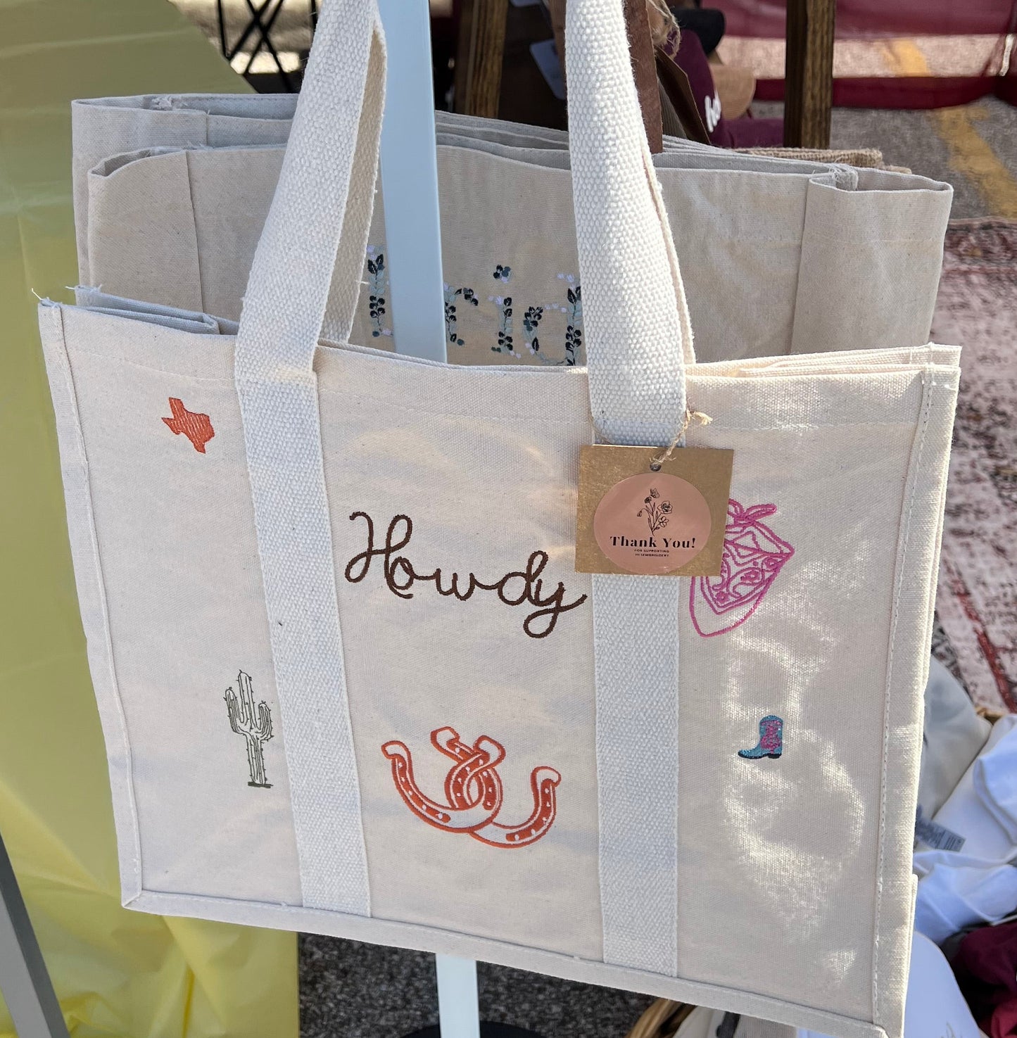Canvas Tote bag with Howdy wording and icons embroidered on the front