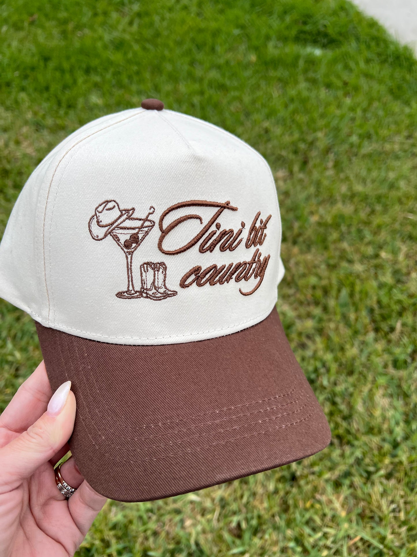 Beige and brown Cap with 'First let country' text embroidered on front