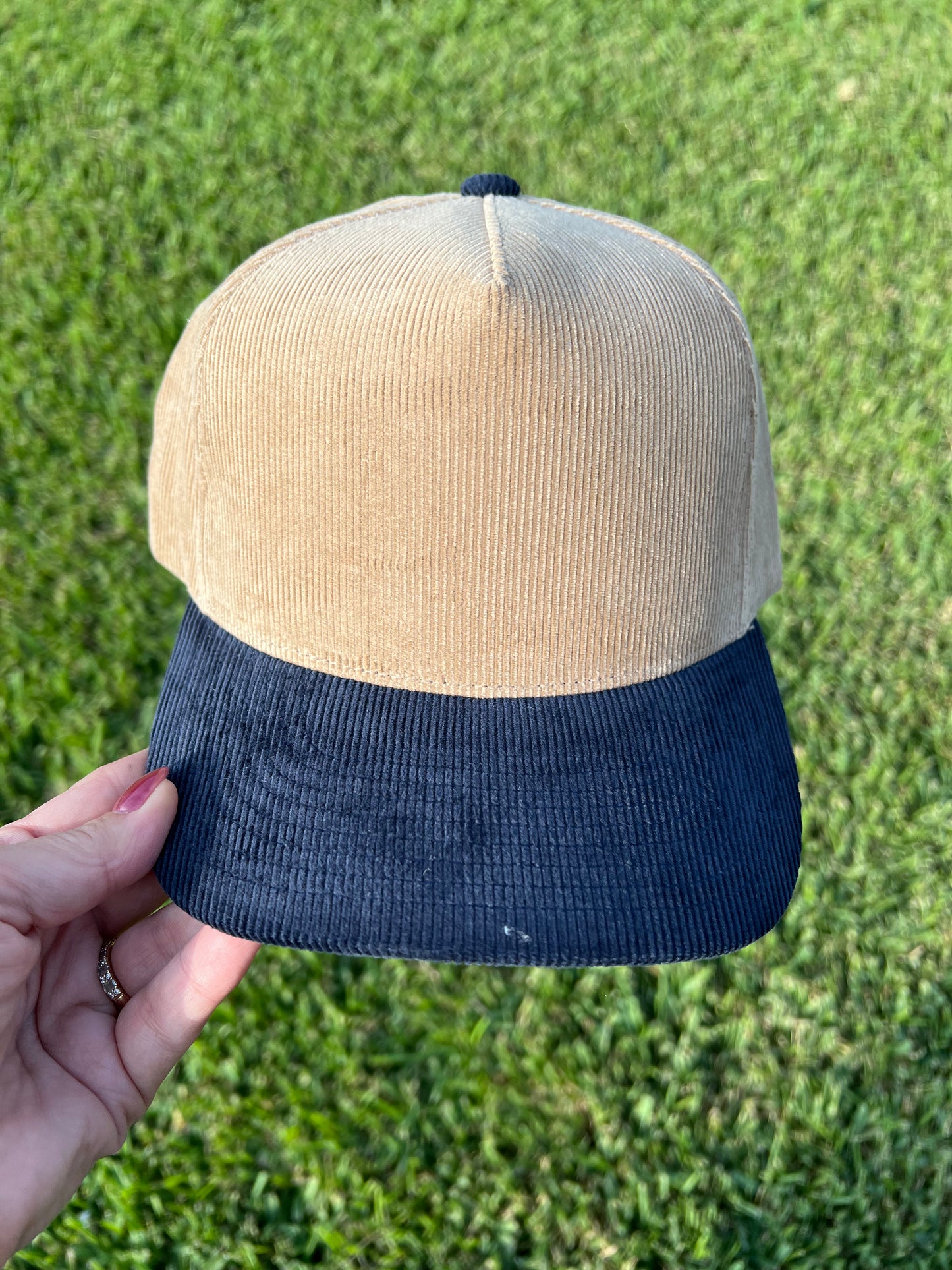 beige and navy corduroy cap