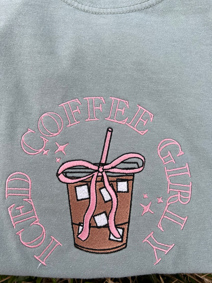 Light green shirt with pink 'Coffee Girlie' embroidery and coffee cup design.