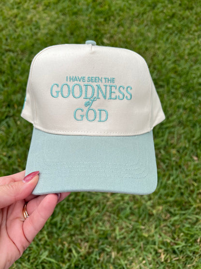 Sage and beige hat with "I have seen the goodness of god"