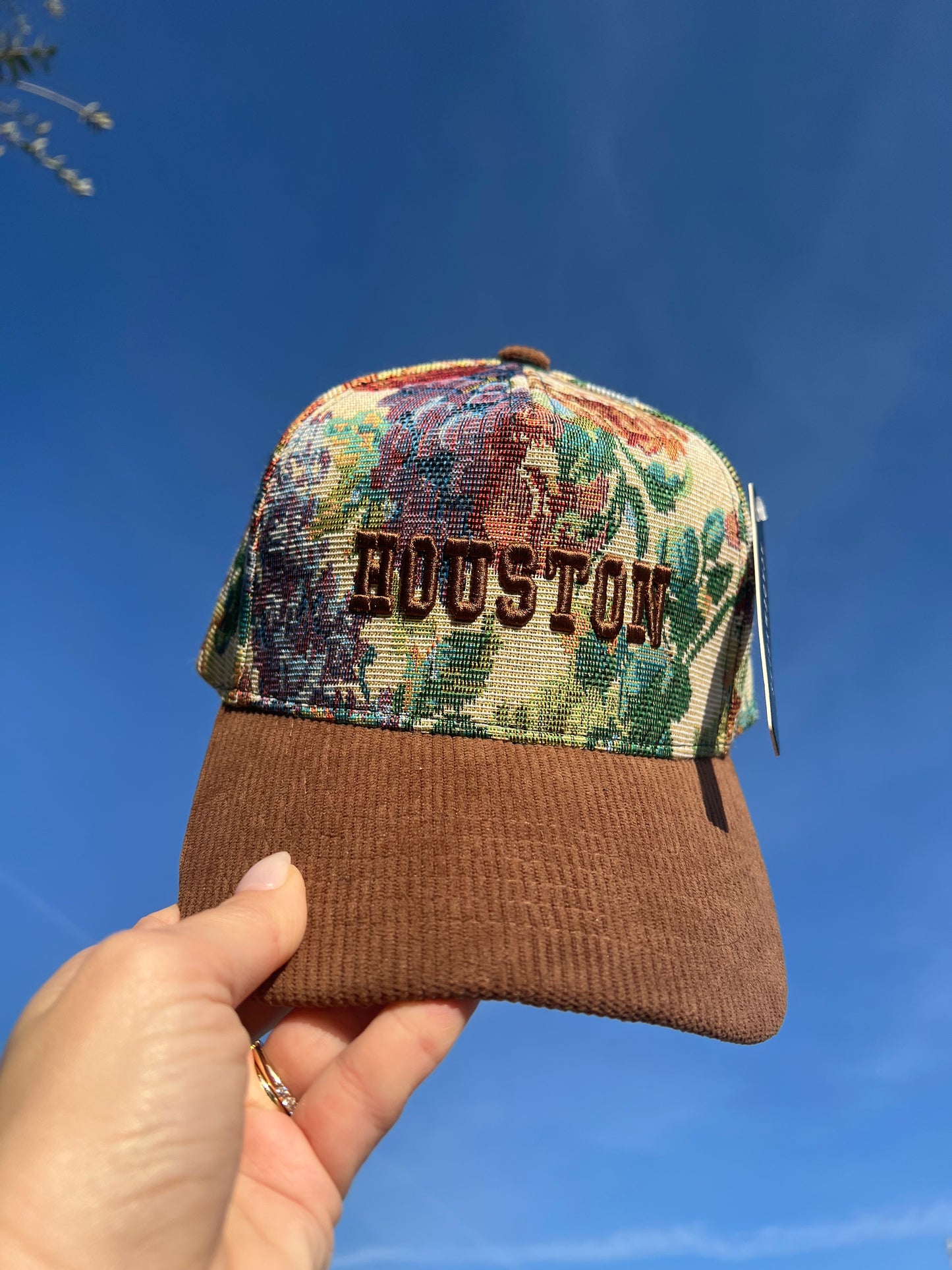 Floral Tapestry cap with brown corduroy cap with the words Houston in  brown puff embroidery 