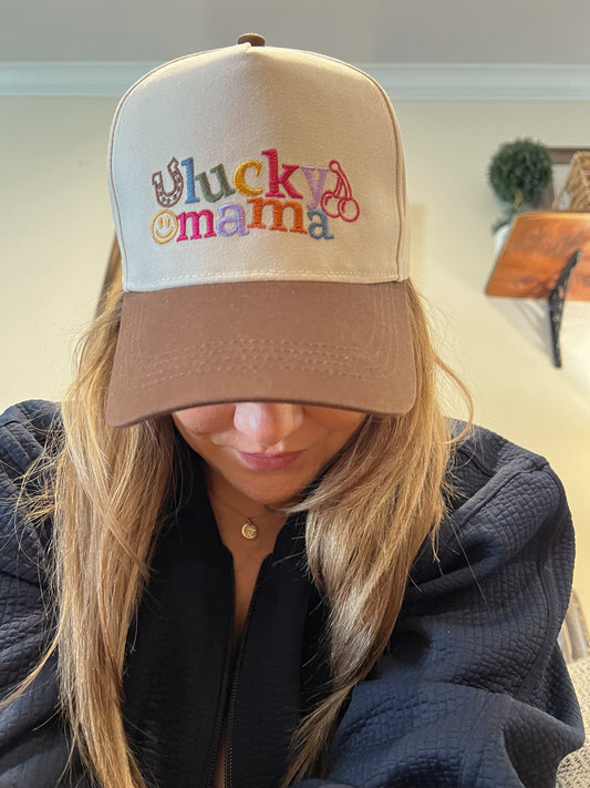 beige and brown hat with embroidered colorful wording and motifs "lucky mama"