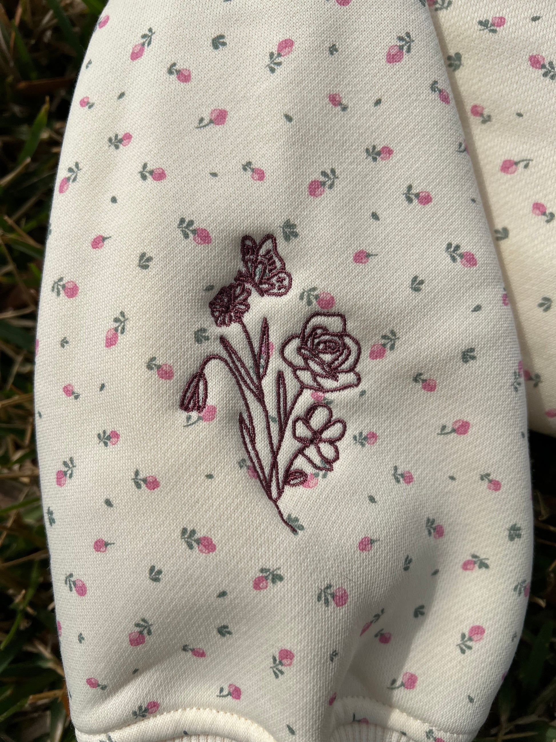 Sleeve embroidery floral detail 