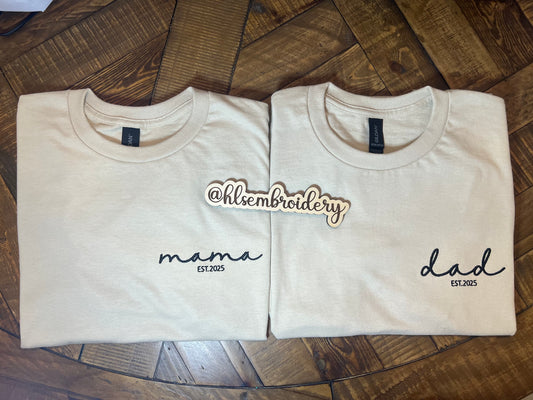 Two Sand color shirts with embroidery on the front 