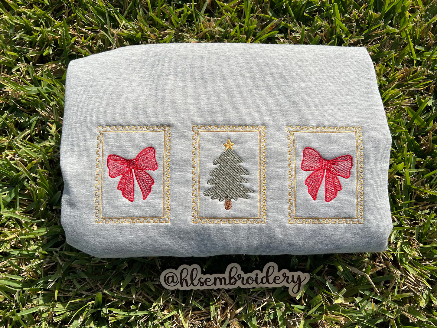 Embroidered Christmas design on a gray fabric 