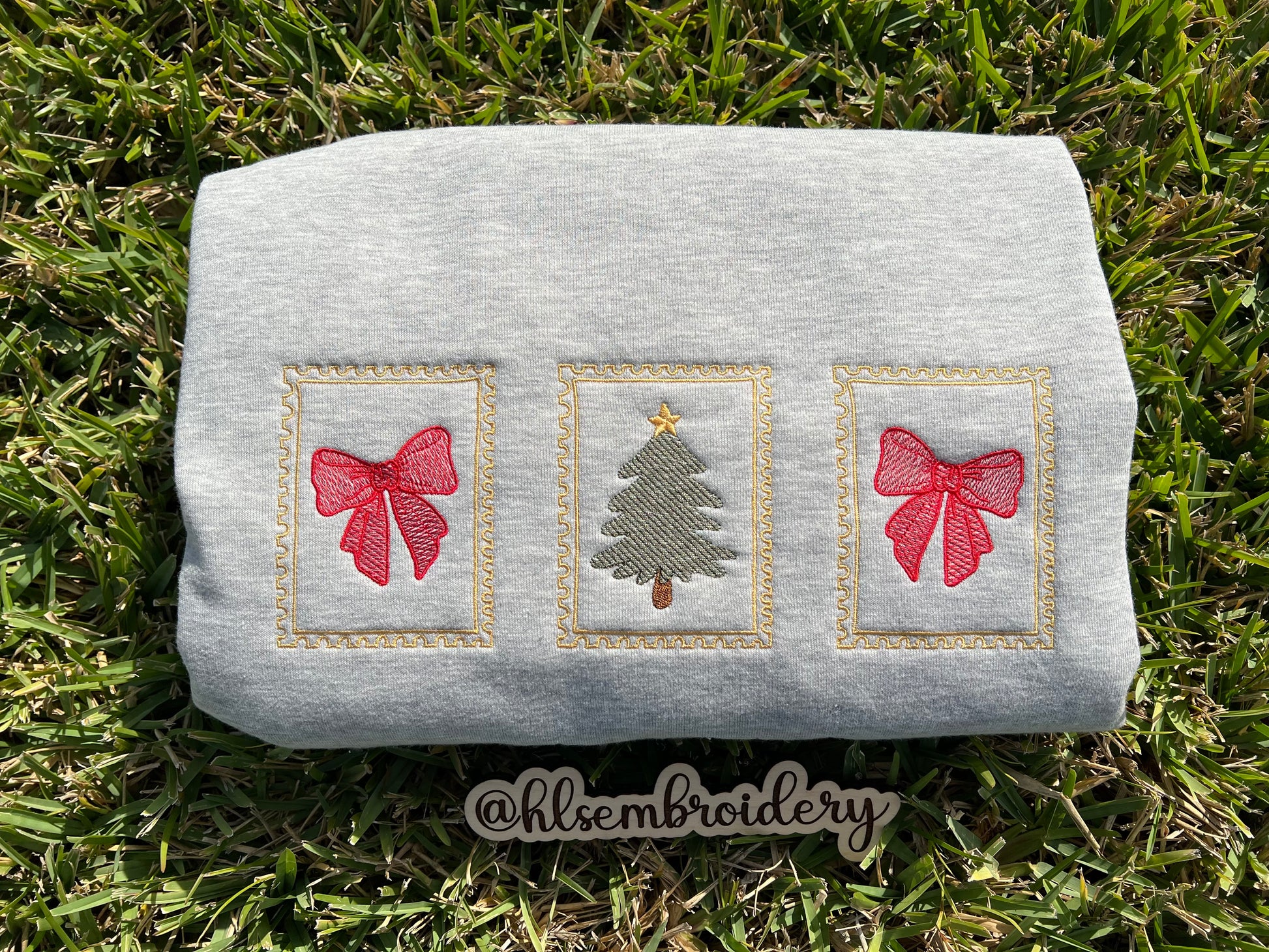 Embroidered Christmas design on a gray fabric 