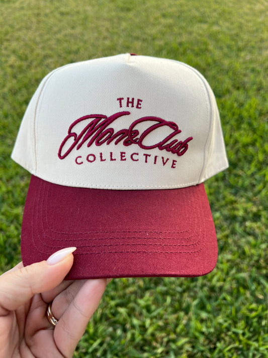 beige and maroon cap  'The Mom Club Collective embroidered on the front
