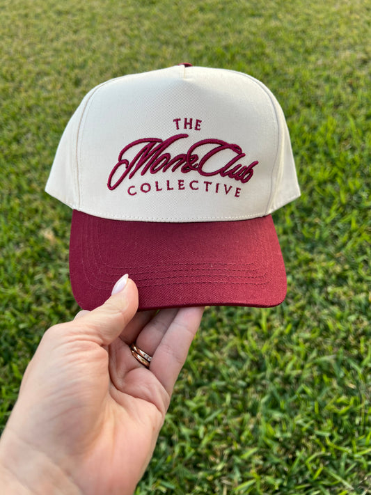 beige and maroon cap  'The Mom Club Collective embroidered on the front