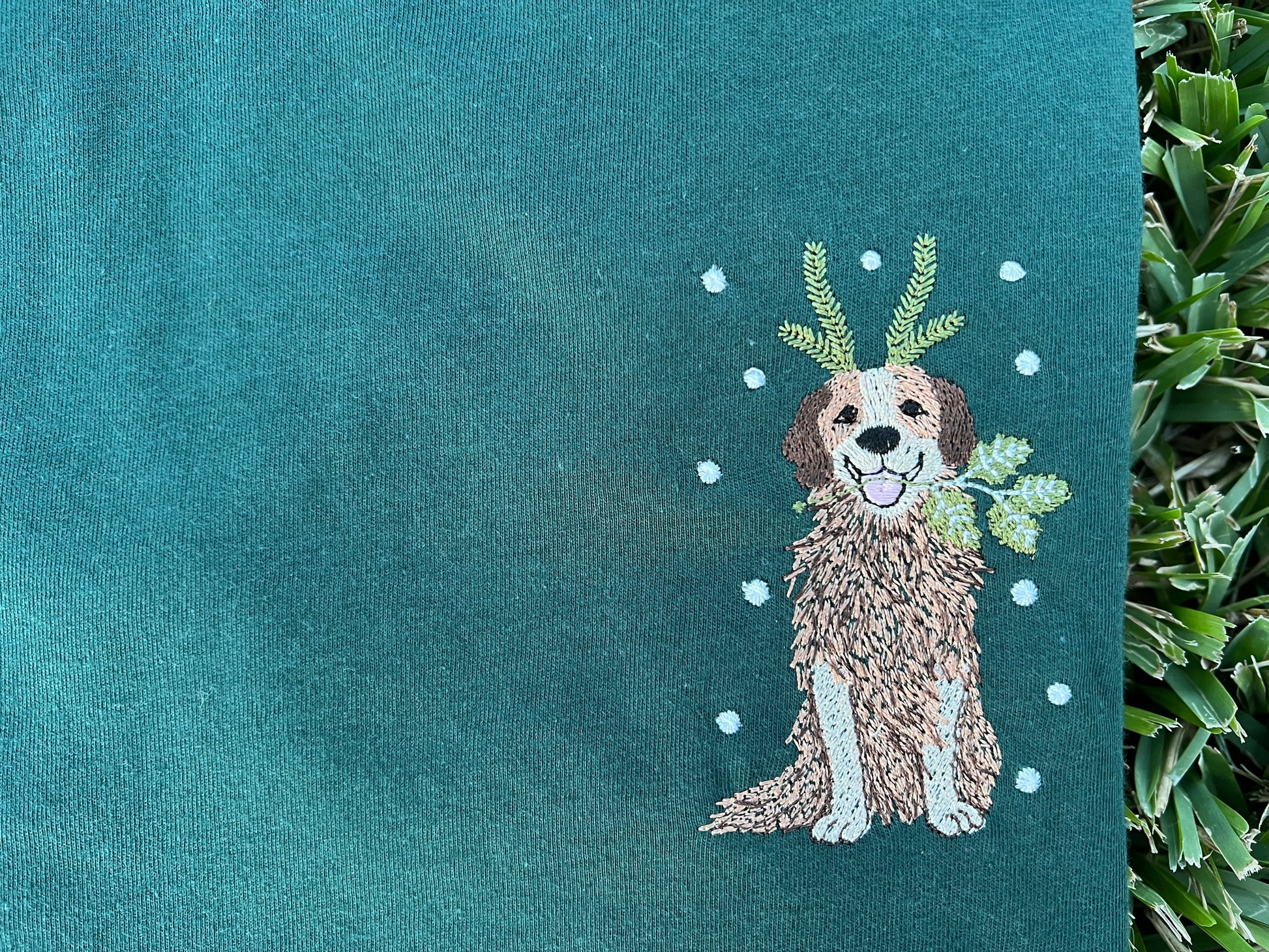 Green Shirt with holiday dog embroidered on the front 