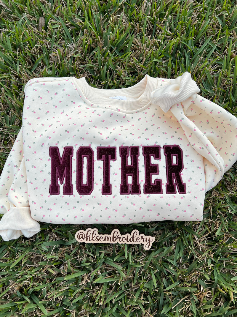 Signature Butter Yellow Floral Crewneck with Mother Embroidery Appliqué and Sparkle Velvet. 