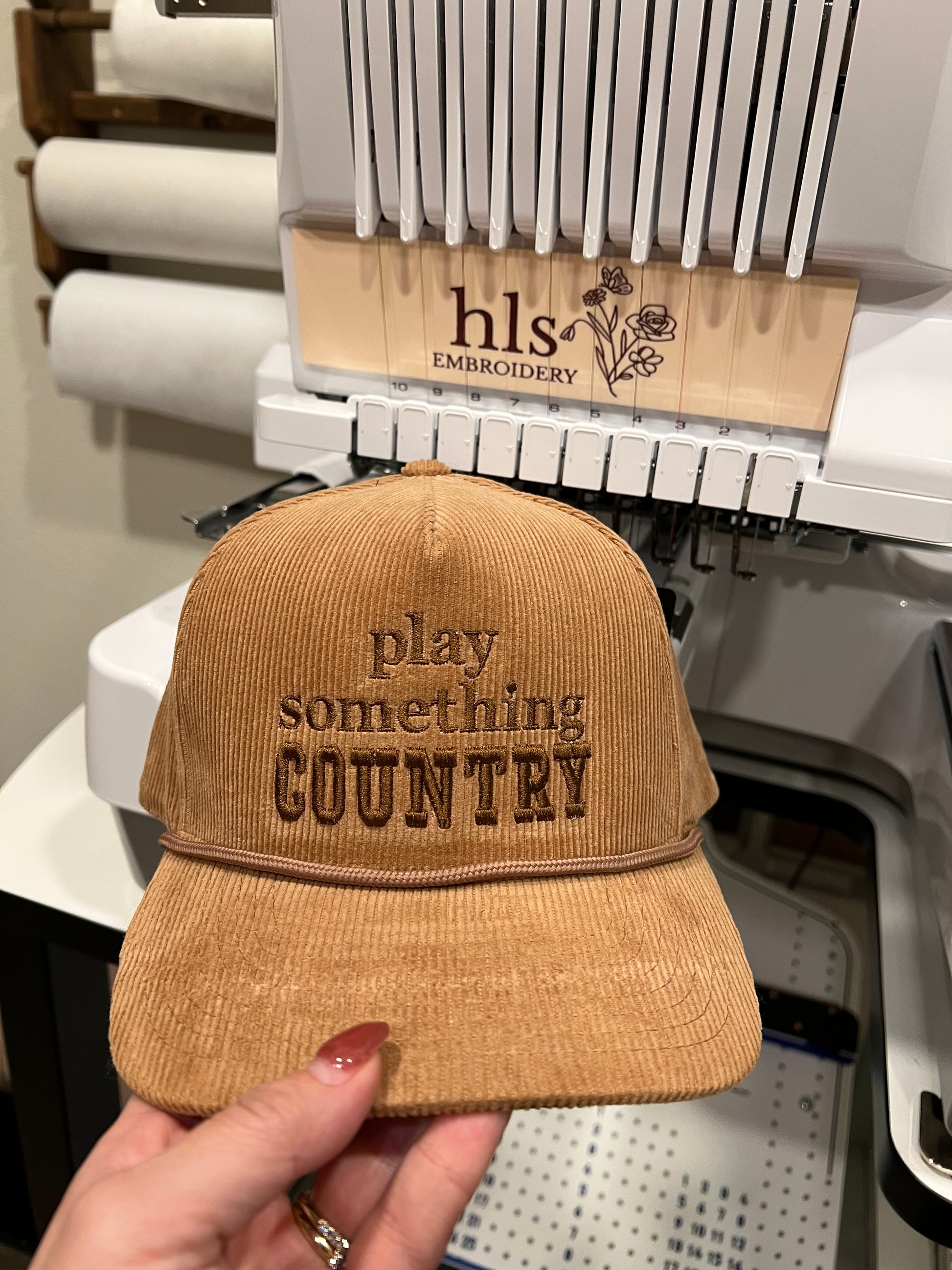 Brown Corduroy  with 'play something country' embroidery