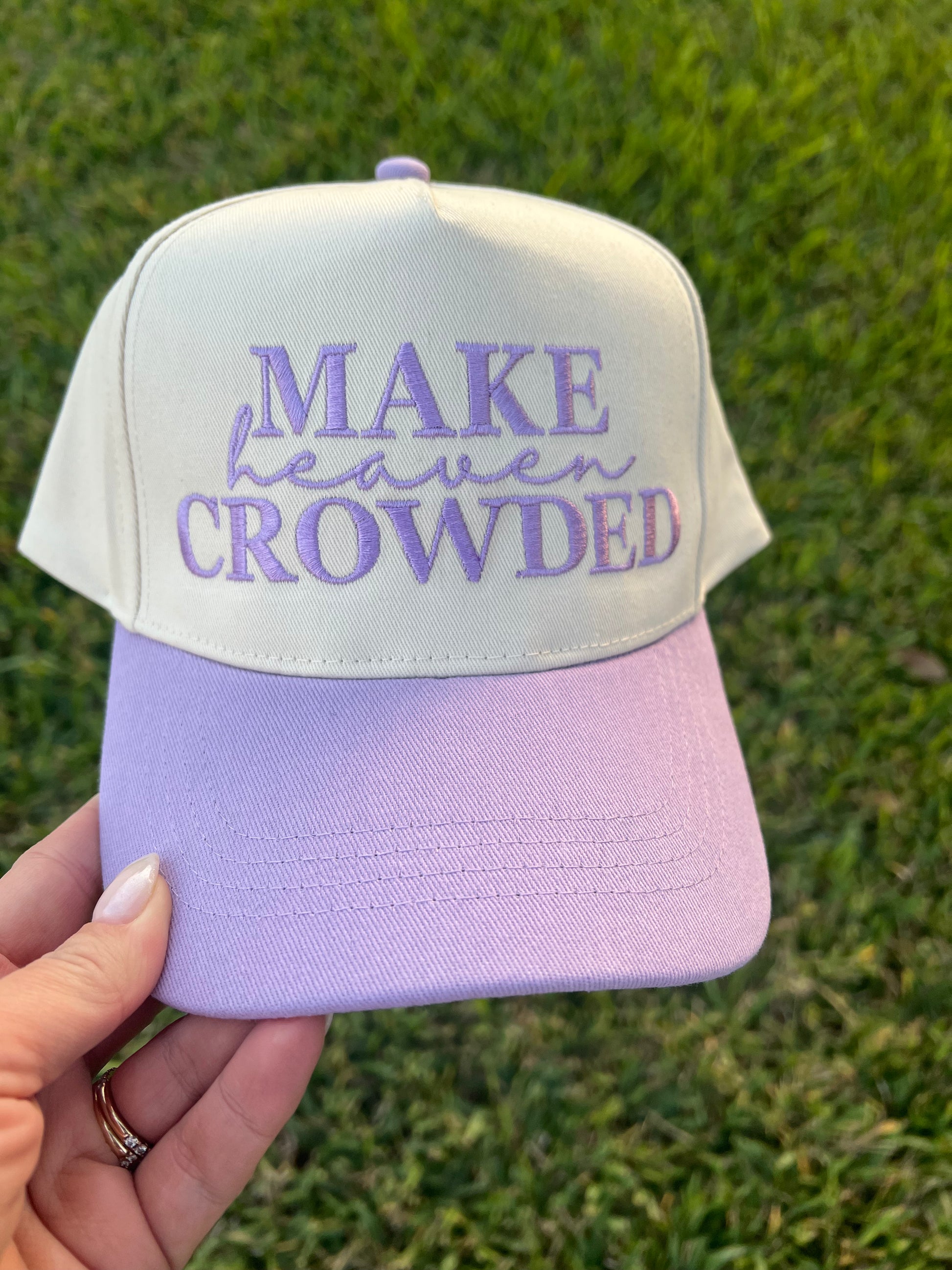 beige and lavender Cap with 'MAKE heaven CROWDED' text embroidery on front
