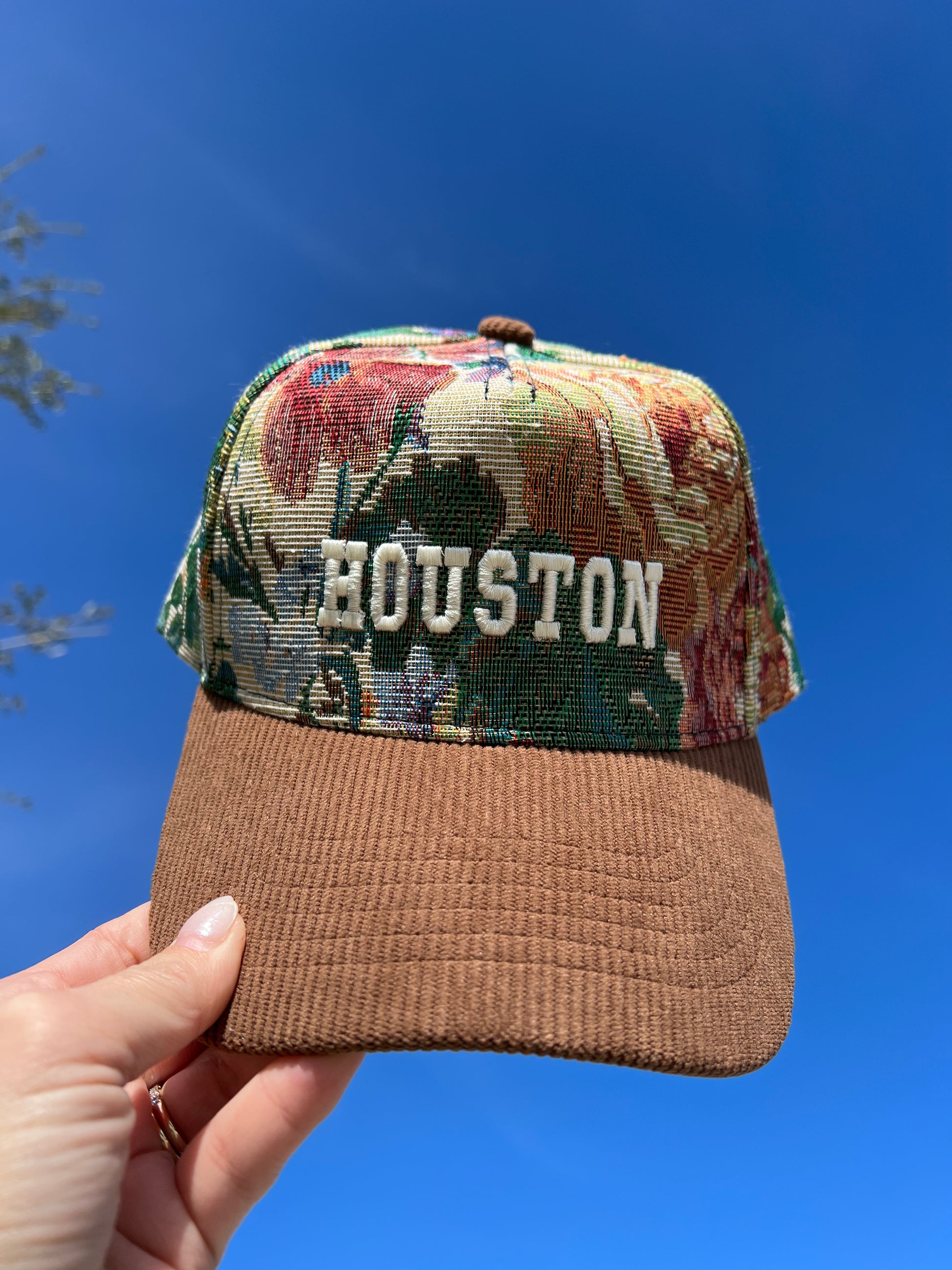 Floral Tapestry cap with brown corduroy cap with the words Houston in  white puff embroidery 