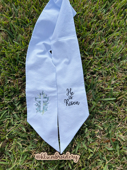 Embroidered wreath  sash with 'He is Risen' text 