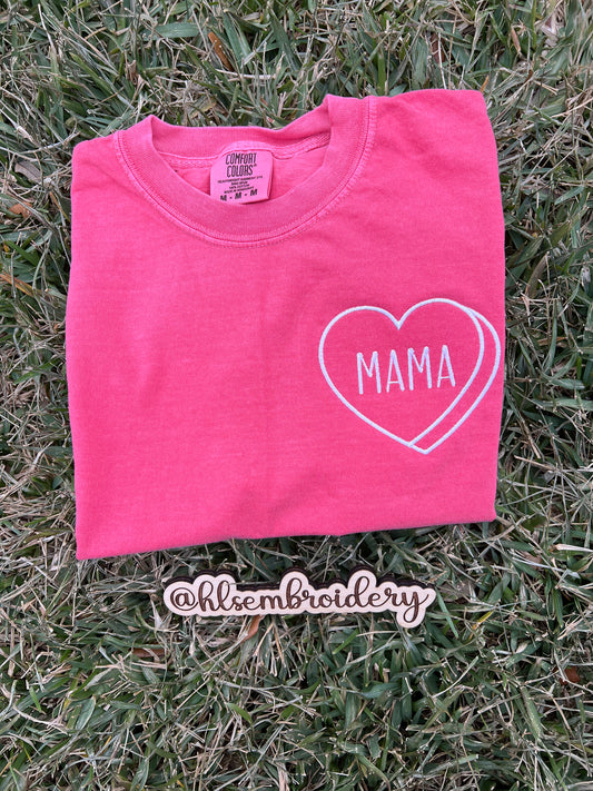Pink shirt with embroidered heart with mama on the inside embroidered. 