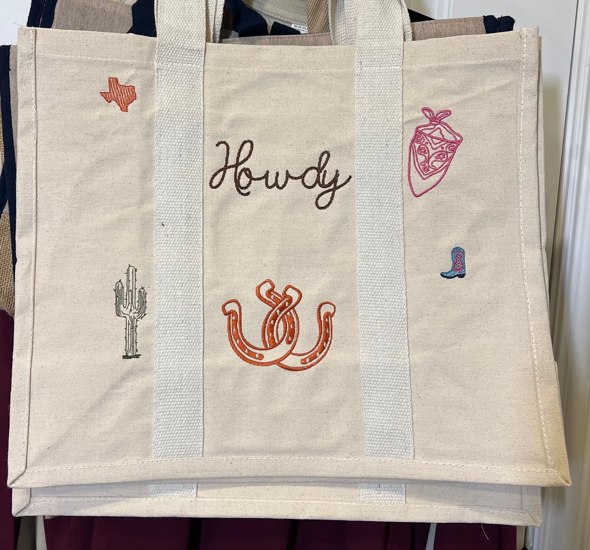 Canvas Tote bag with Howdy wording and icons embroidered on the front