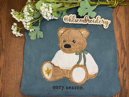 Green shirt with a teddy bear applique embroidery