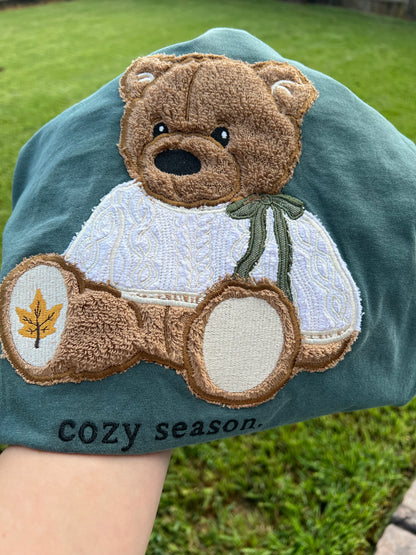 Green shirt with a teddy bear applique embroidery