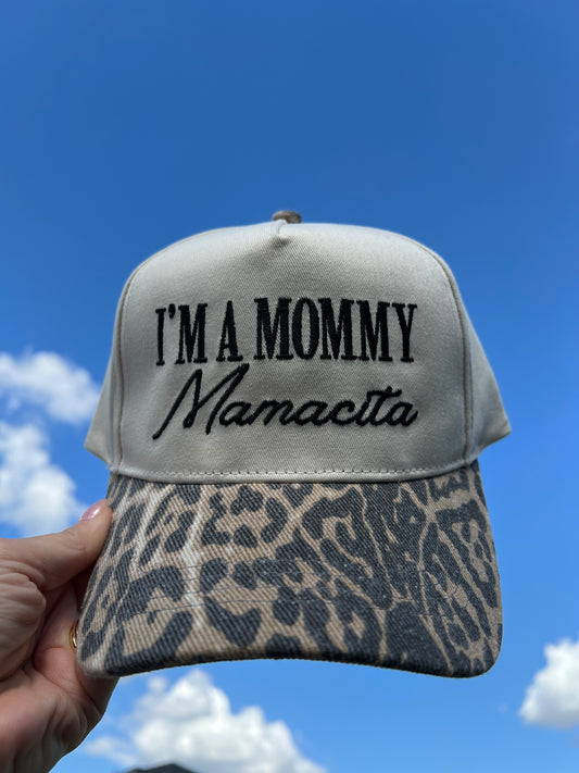 beige and leopard print cap with the wording embroidered I'm a mommy Mamacita