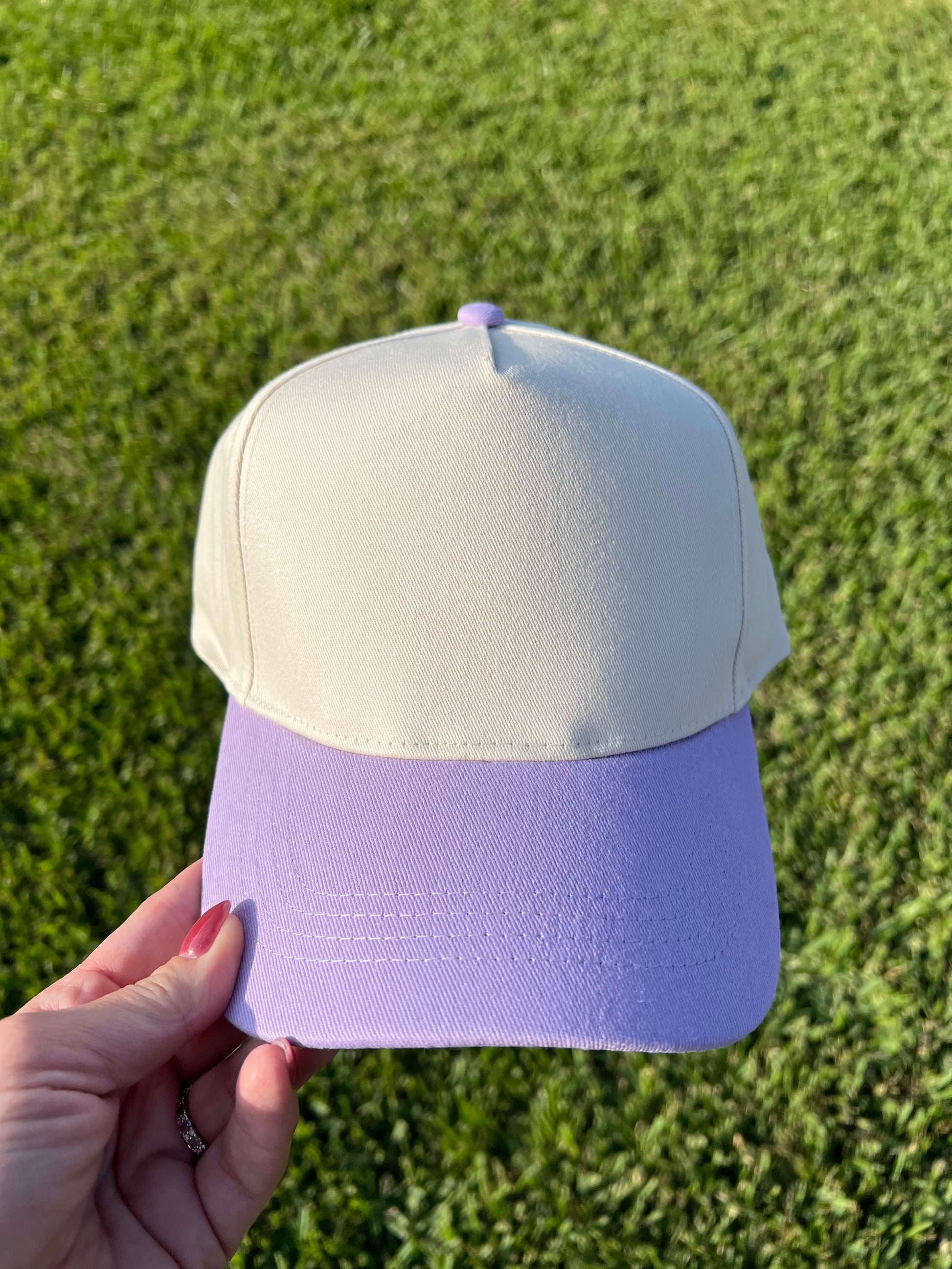beige and lavender color cap 