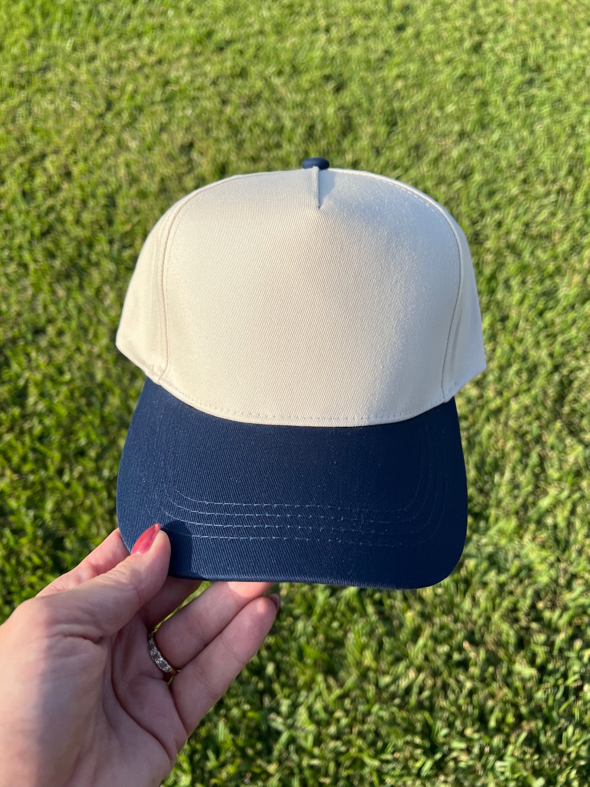 beige and navy cap 