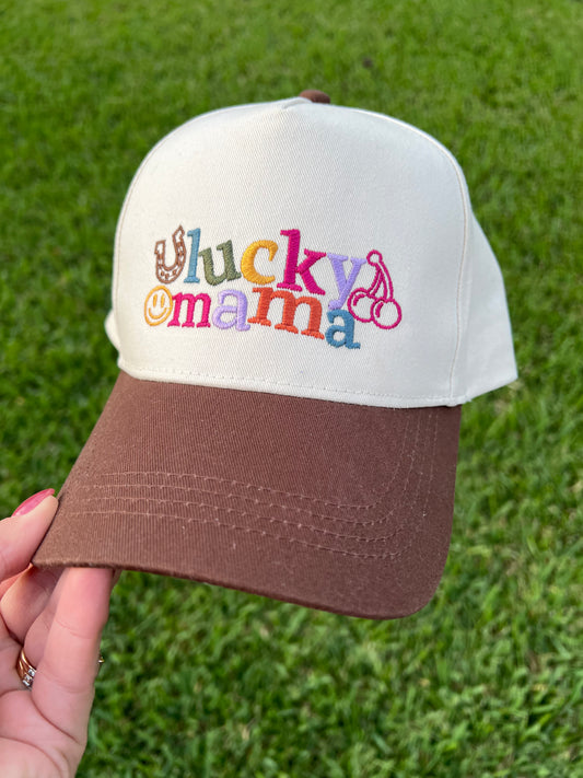 beige and brown hat with embroidered colorful wording and motifs "lucky mama"