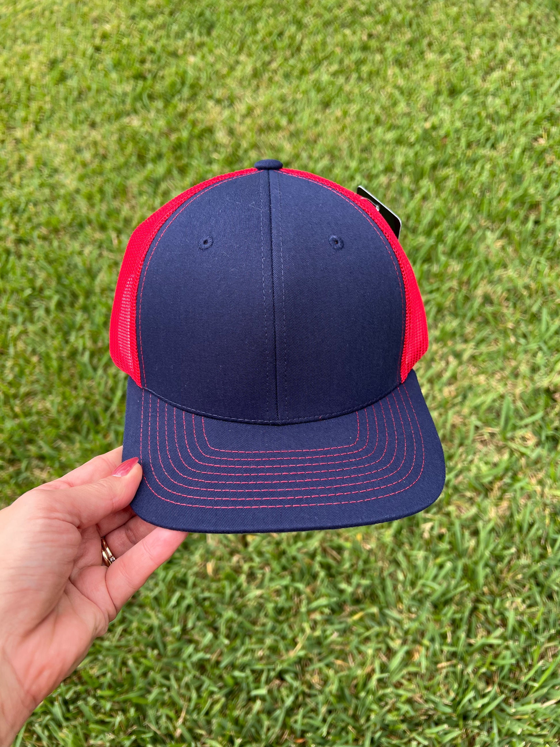 navy and red cap 