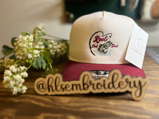 beige and maroon cap with Reel cool Dad with Fish design 