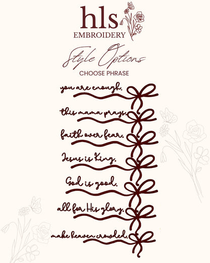 Embroidery design with phrases and decorative elements on a white background