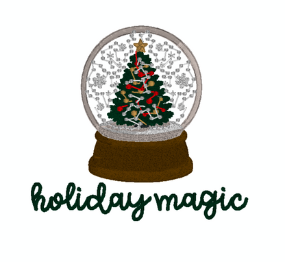 Snow globe with Christmas tree design and 'holiday magic' text on a white background