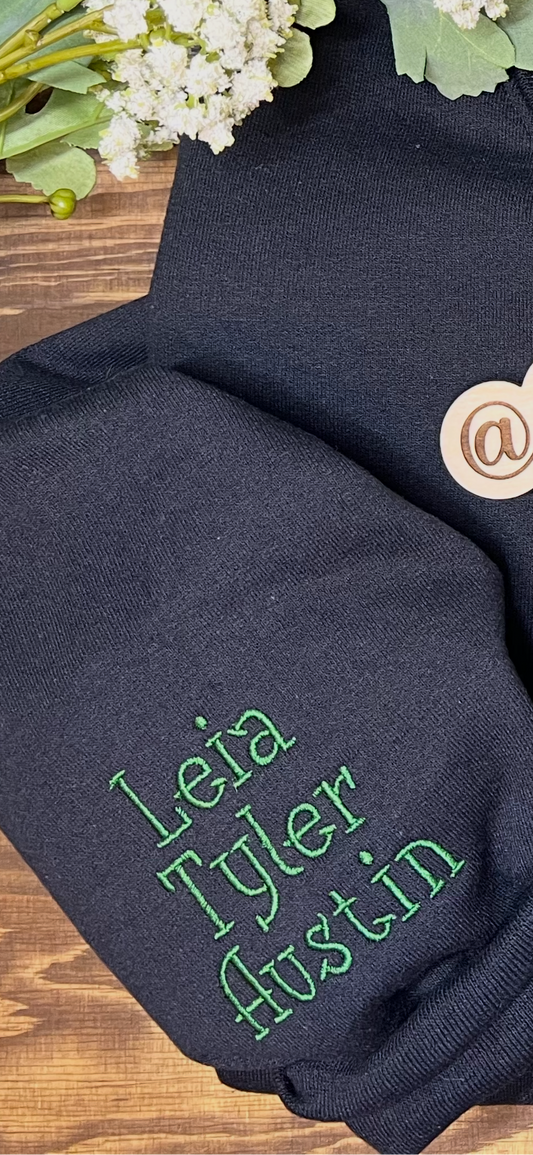 Black crewneck with  sleeve embroidery example